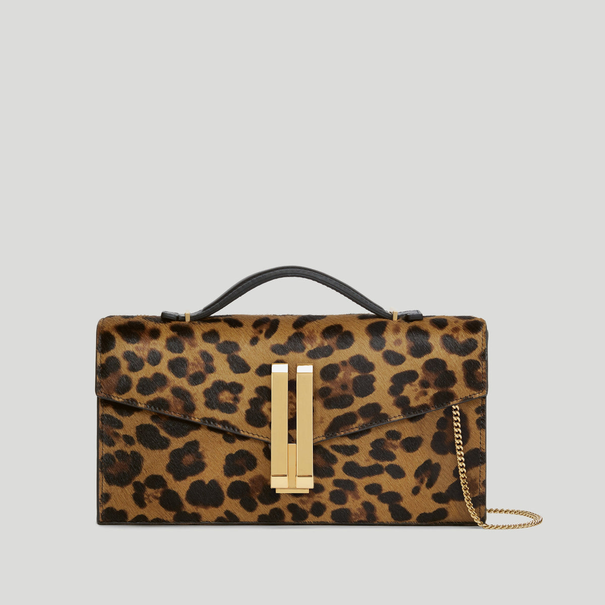 The Vancouver Clutch - leopard-effect calf hair & black smooth -